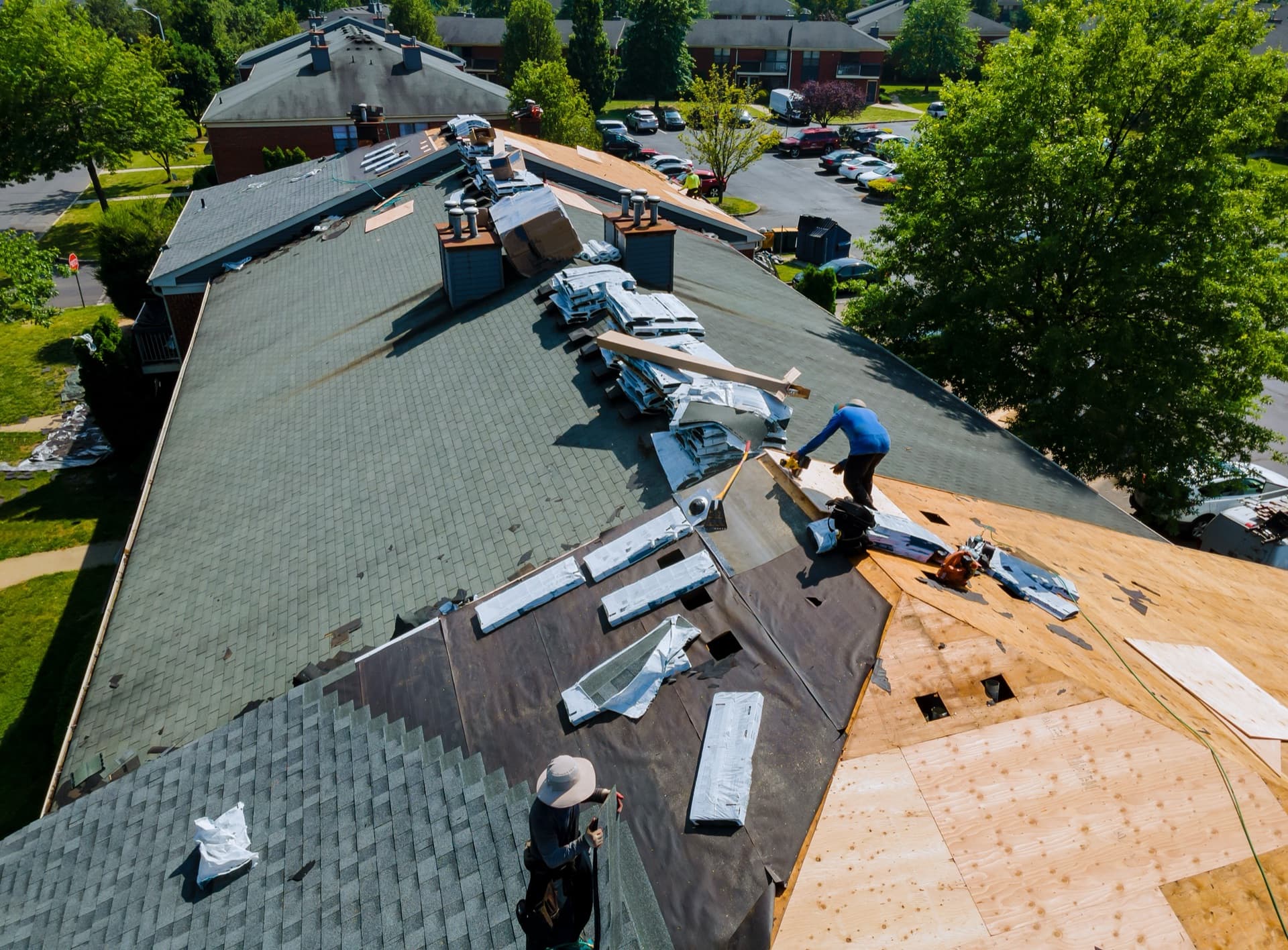 Professional roofer working on a residential roof installation